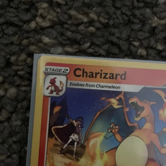 Pokemon Charizard Trading Card - Red and Yellow also has a sleeve - Picture 5 of 9